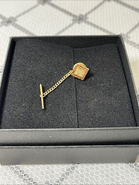 Gold Tie Tack with Chain - Classic Square Design
D on face